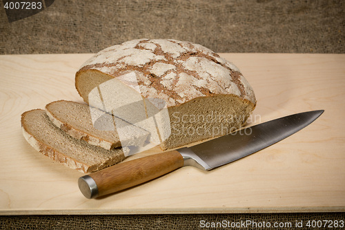 Image of A slice of bread with butter 