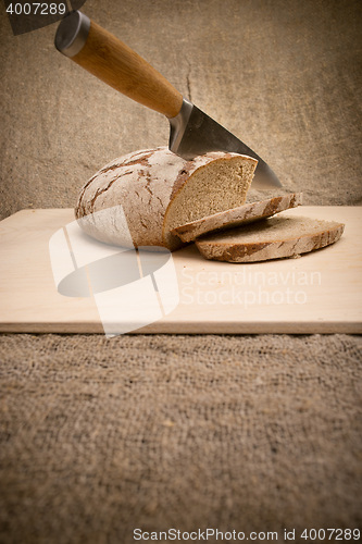 Image of A slice of bread with butter 