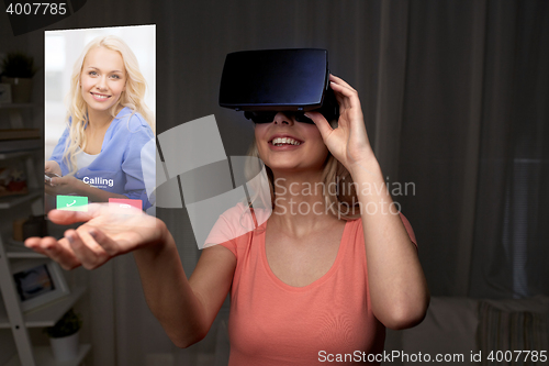 Image of woman in virtual reality headset or 3d glasses