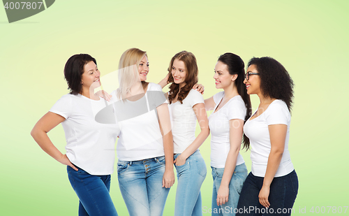 Image of group of happy different women in white t-shirts