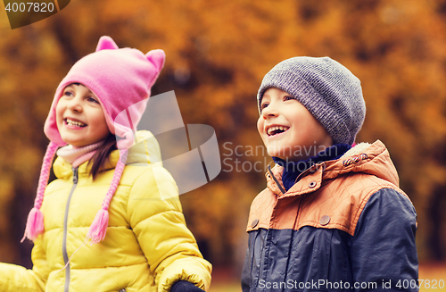 Image of group of happy children in autumn park