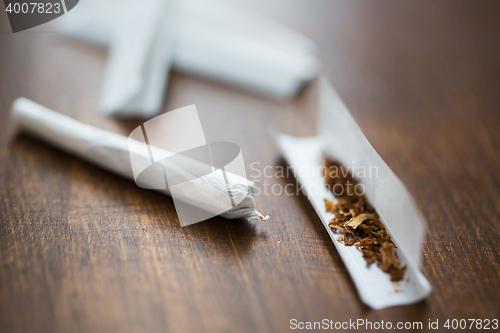Image of close up of marijuana joint and tobacco