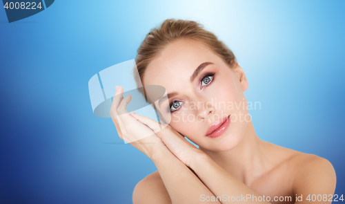 Image of beautiful young woman face and hands