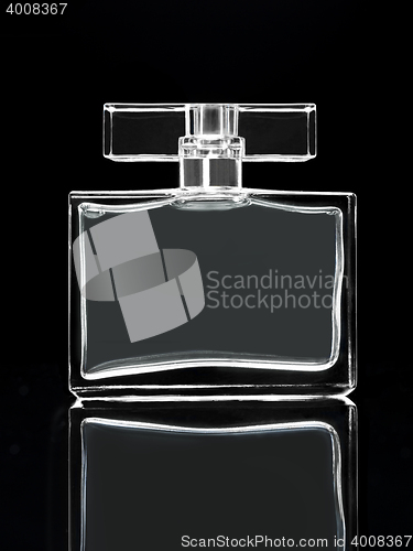 Image of gray elegant perfume bottle in black background