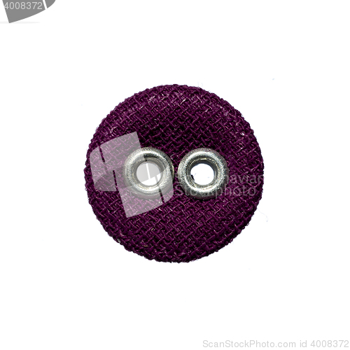 Image of round button with two holes made of fabric