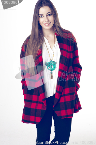 Image of fashionable young model posing with trendy clothes