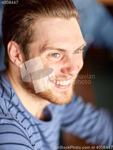 Image of happy smiling young man face