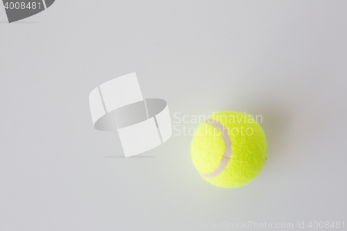 Image of close up of tennis ball over white background