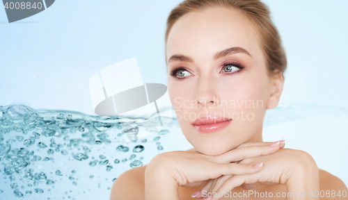 Image of beautiful young woman face and hands