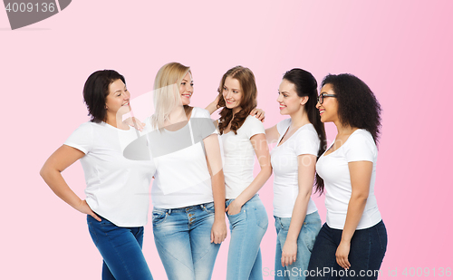 Image of group of happy different women in white t-shirts