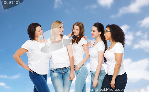 Image of group of happy different women in white t-shirts