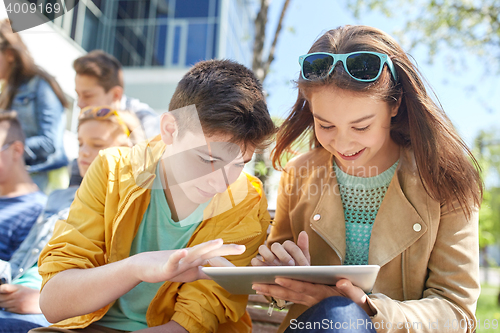 Image of group of students with tablet pc at school yard