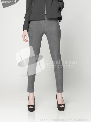 Image of fashionable youn slim woman posing in look book