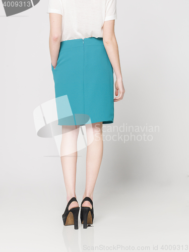 Image of fashionable youn slim woman posing in look book