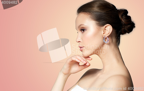 Image of close up of beautiful woman face with earring