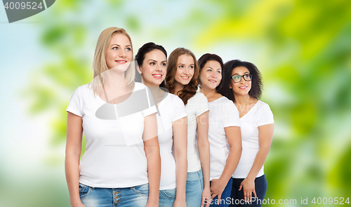 Image of group of happy different women in white t-shirts