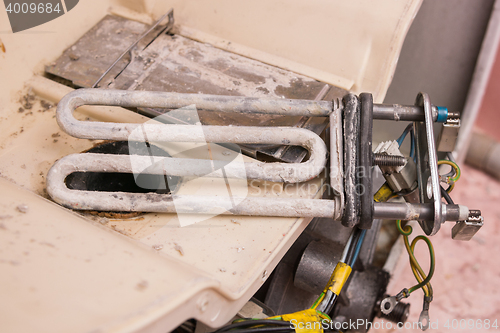 Image of Scale on the heating element of the washing machine