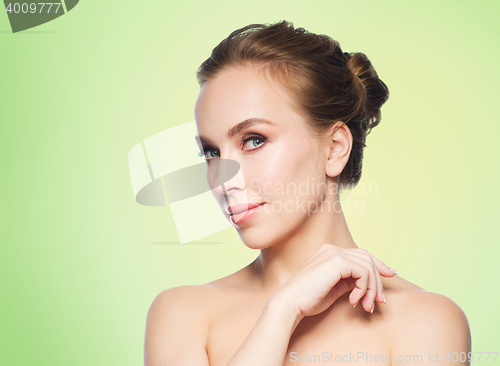 Image of beautiful young woman face over white background