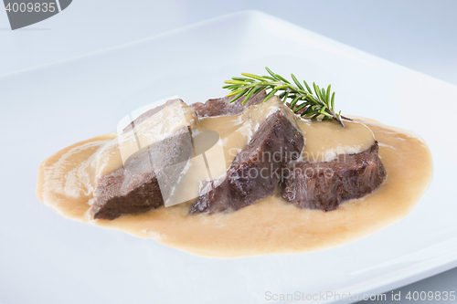 Image of stew beef cheeks with wine sauce spanish recipe