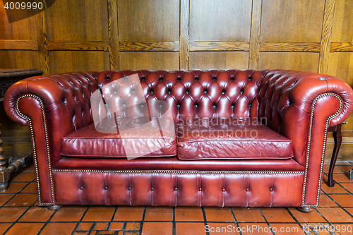 Image of close up of vintage leather sofa