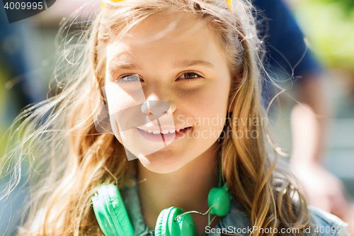 Image of happy teenage girl with headphones