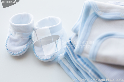 Image of close up of baby boys clothes for newborn on table