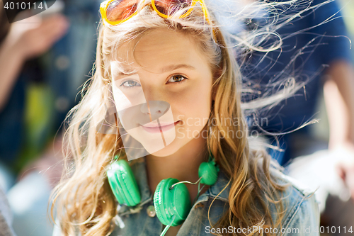 Image of happy teenage girl with headphones