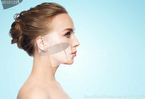 Image of beautiful young woman face over white background