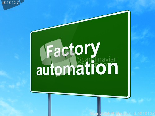 Image of Industry concept: Factory Automation on road sign background