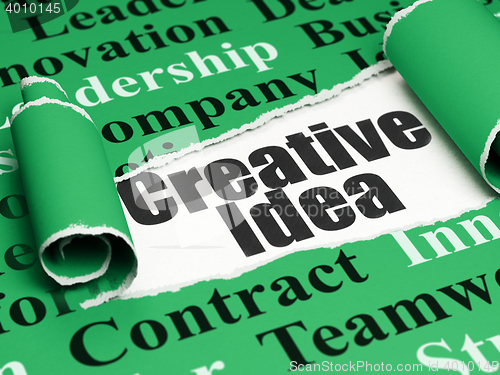 Image of Business concept: black text Creative Idea under the piece of  torn paper