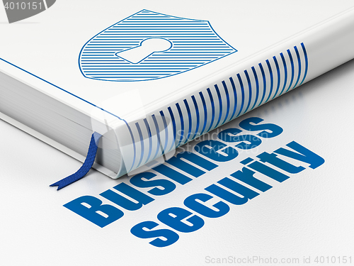 Image of Security concept: book Shield With Keyhole, Business Security on white background