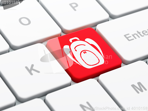 Image of Studying concept: Backpack on computer keyboard background