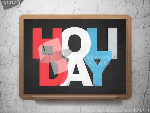 Image of Holiday concept: Holiday on School board background
