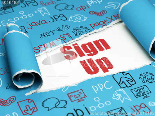 Image of Web development concept: red text Sign Up under the piece of  torn paper