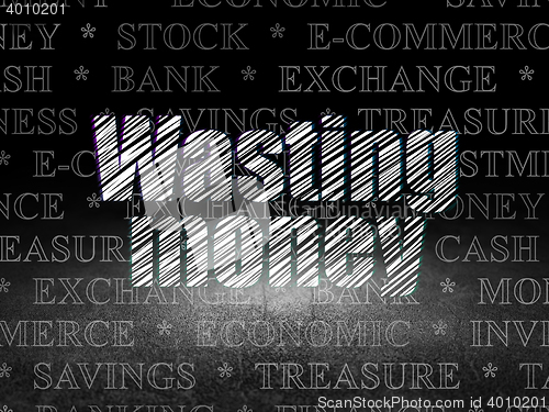 Image of Currency concept: Wasting Money in grunge dark room
