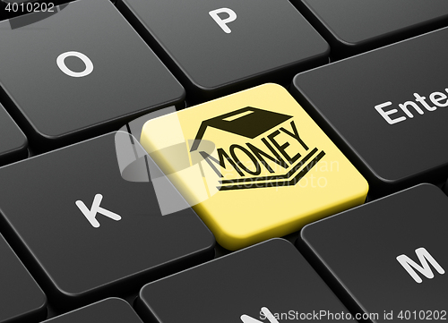 Image of Banking concept: Money Box on computer keyboard background