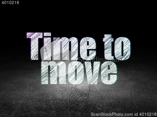 Image of Time concept: Time to Move in grunge dark room