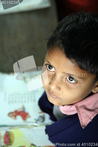 Image of  Portrait of schoolboy at school, Kumrokhali, West Bengal, India