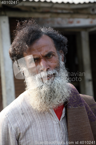 Image of Portrait of a day laborer in Kumrokhali, West Bengal, India