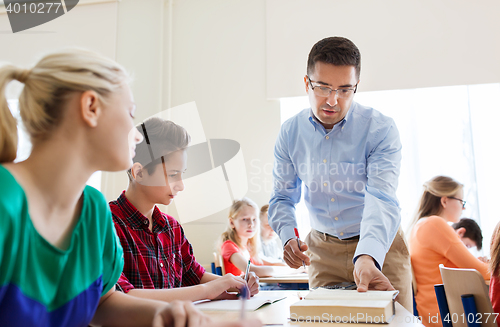 Image of group of students and teacher at school classroom