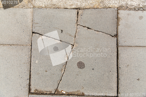 Image of close up of cracked stone plate