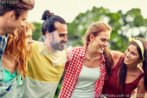 Image of group of smiling friends outdoors