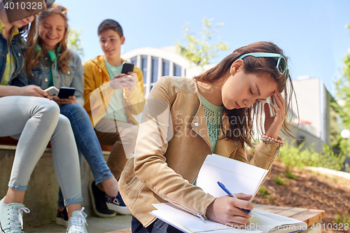 Image of student girl suffering of classmates mockery