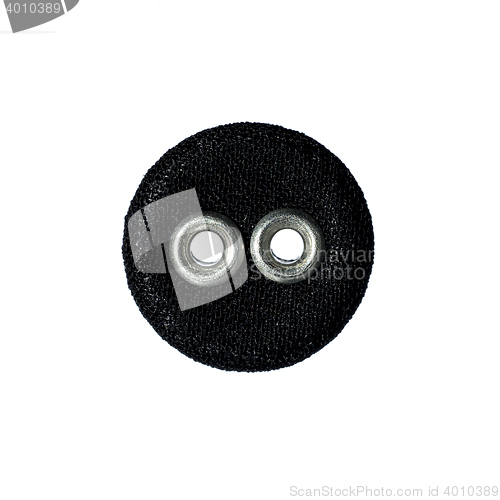 Image of round button with two holes made of fabric
