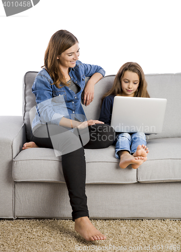 Image of Mother teaching her little daughter