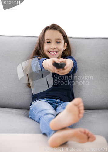 Image of Girl holding a TV remote