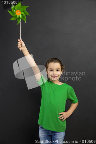 Image of Little girl holding a windmill