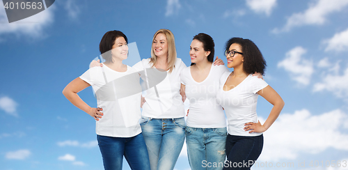 Image of group of happy different women in white t-shirts