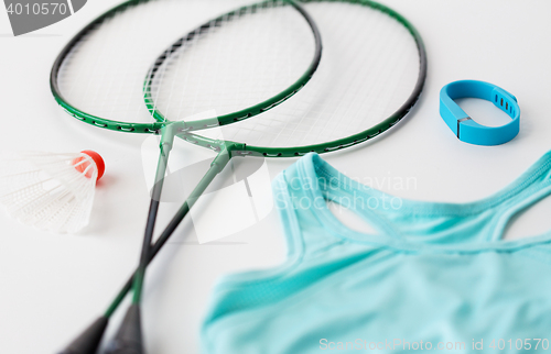 Image of close up of badminton rackets with shuttlecock