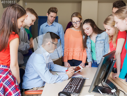 Image of group of students and teacher at school classroom